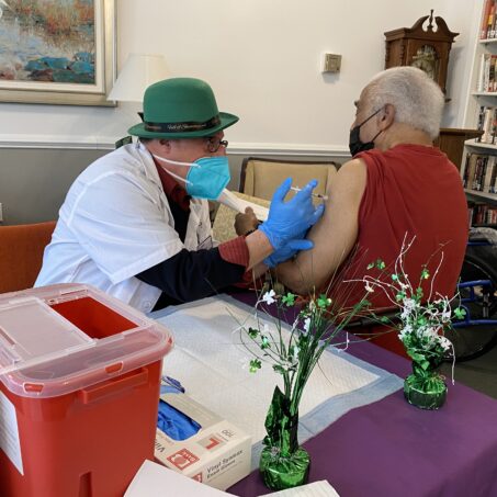 Member Uses Grant to Combine Vaccine Clinic, St. Pat’s Day Party for Residents