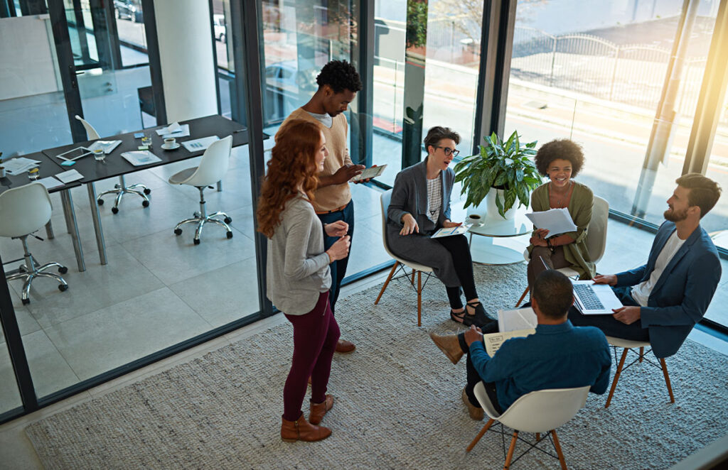 diverse group of young professionals meeting in office 588269192 1200 776