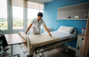 hospital worker laying bed sheets 1496341362 1200 776