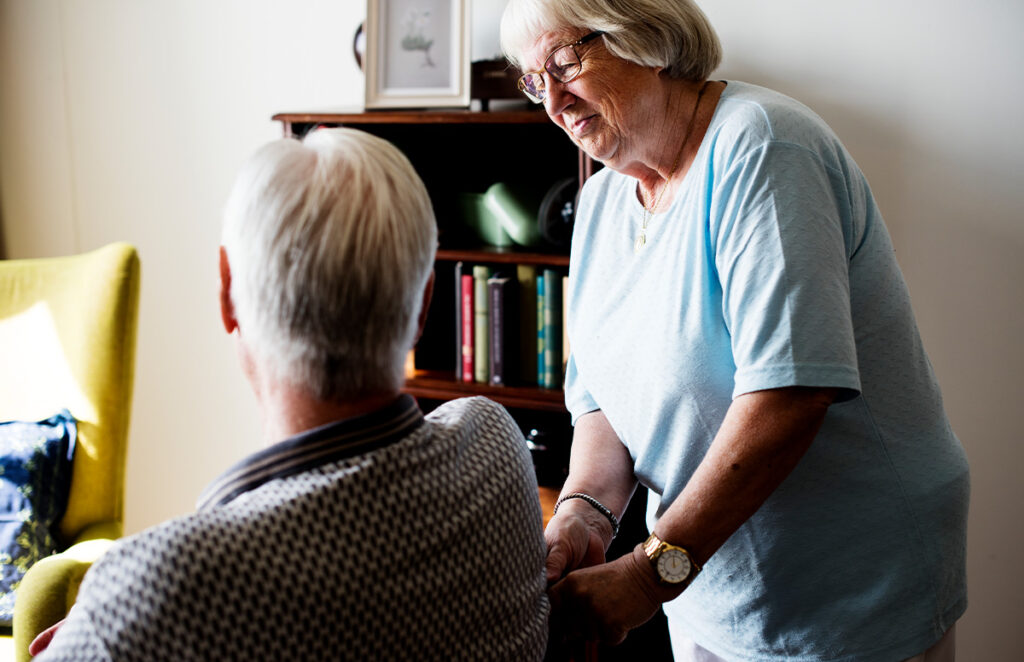 senior woman speaking with husband 1200 776