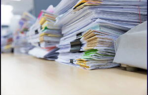 stacks of paper files 932077968 1200 776