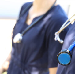 two medical professionals with stethoscopes 1356654993 1200 776