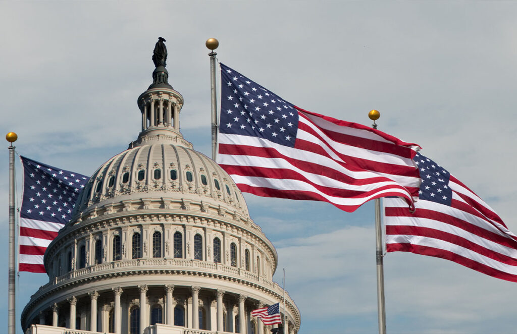 united states capitol with flags flying behind 1403089812 1200 776