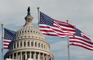united states capitol with flags flying behind 1403089812 1200 776