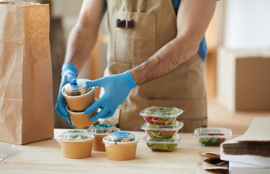 worker preparing food delivery 1200 776