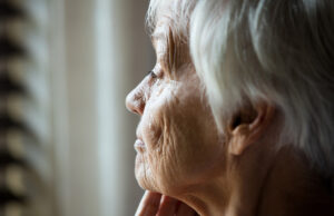 close up of worried senior woman 1200 776