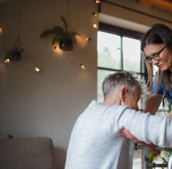 healthcare worker or caregiver visiting senior woman 1200 776