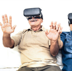senior mature couple having fun together with virtual reality headseats 1200 776