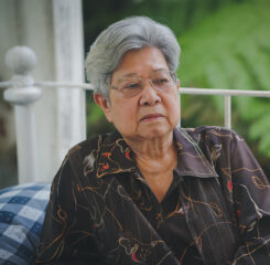 sleepy old elderly elder woman resting relaxing in bed 1200 776