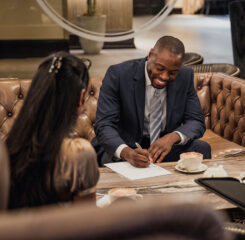 professionals meeting coffee lounge smiling 1200x776 1[1]