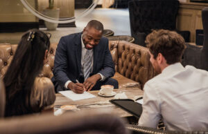 professionals meeting coffee lounge smiling 1200x776 1[1]